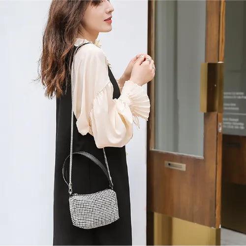 BORSA COMPATTA CON BORCHIE - LUXURY