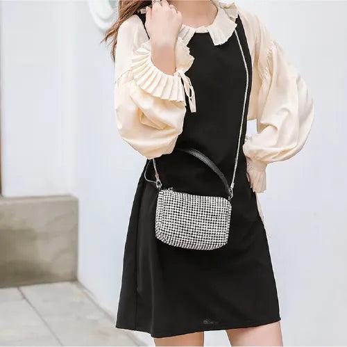 BORSA COMPATTA CON BORCHIE - LUXURY
