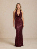 Long sequined dress with a halter neckline