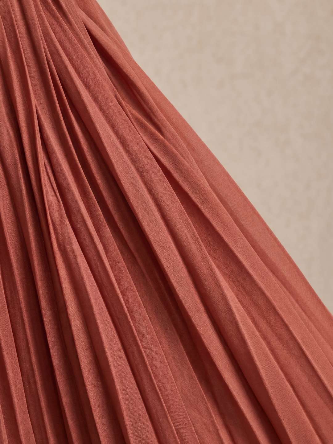 Pleated midi dress with a V-neckline