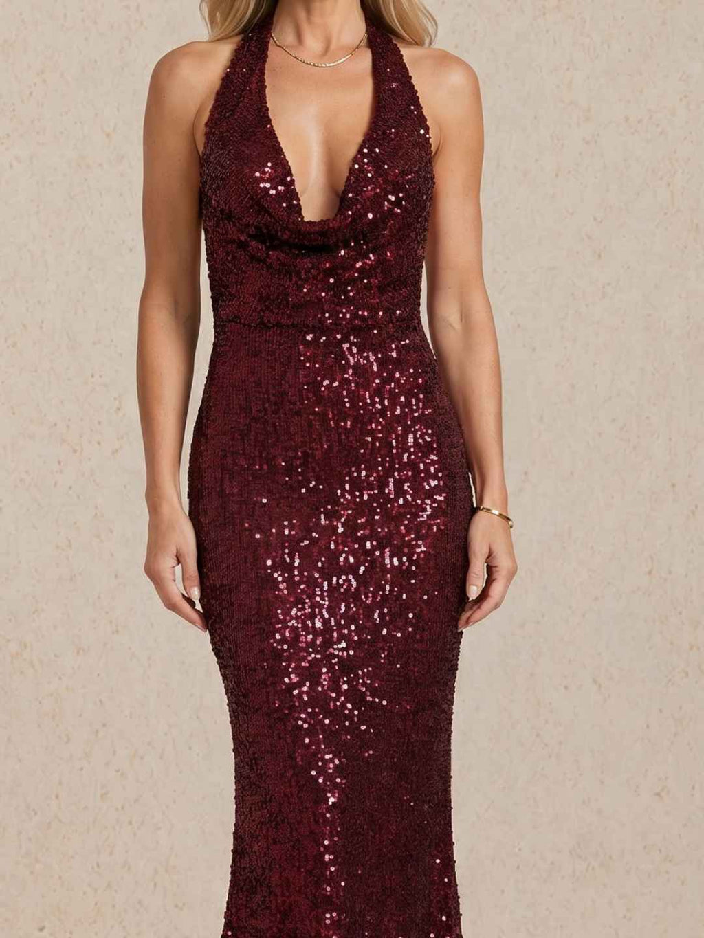 Long sequined dress with a halter neckline