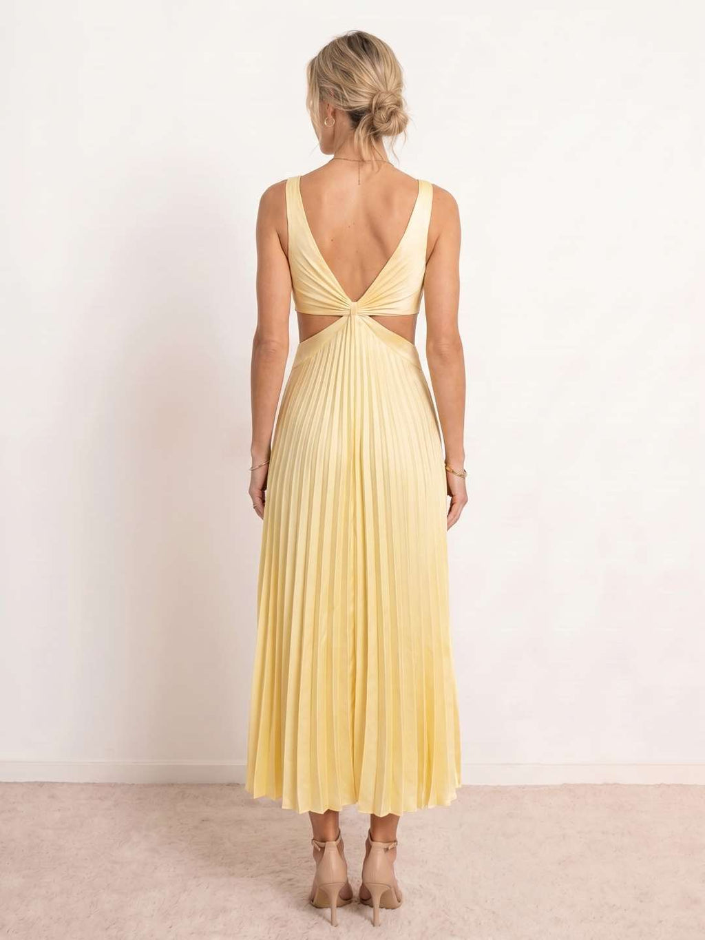 Pleated midi dress with a V-neckline