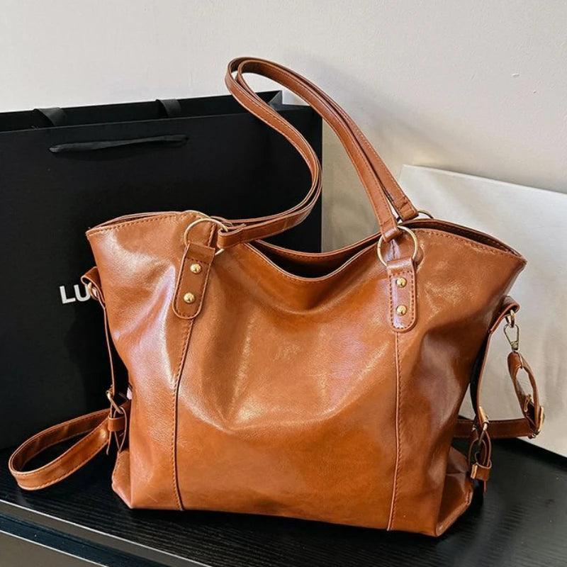 BORSA IN PELLE - DIN