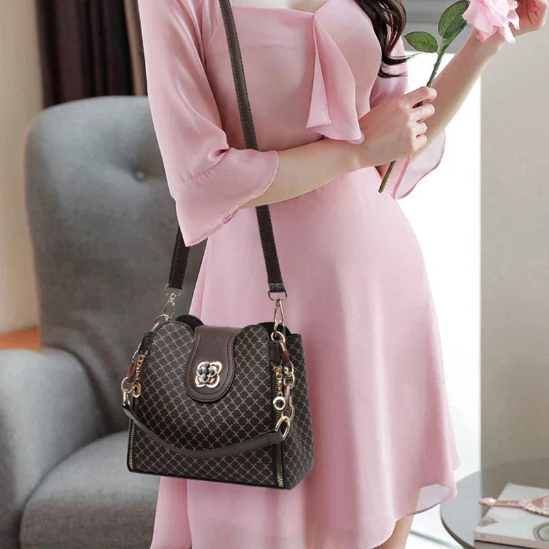 KATÉLISE CHARM BAG