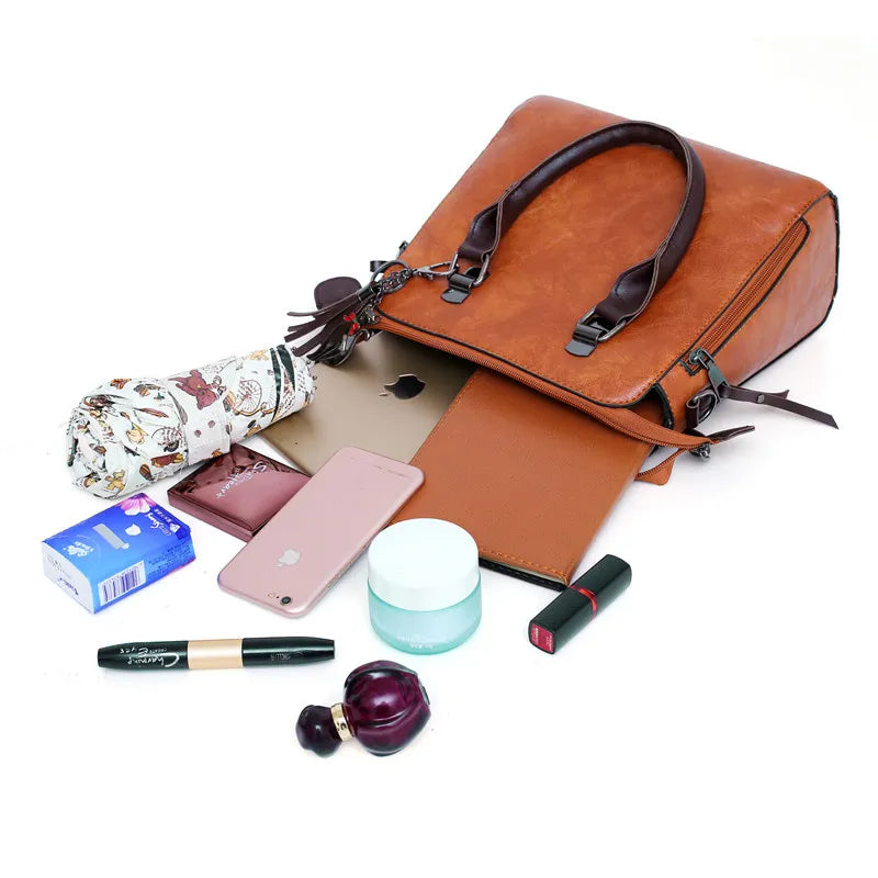 SET PREMIUM - BORSA + PORTAFOGLIO + POCHETTE + NECESSAIRE IN OMAGGIO