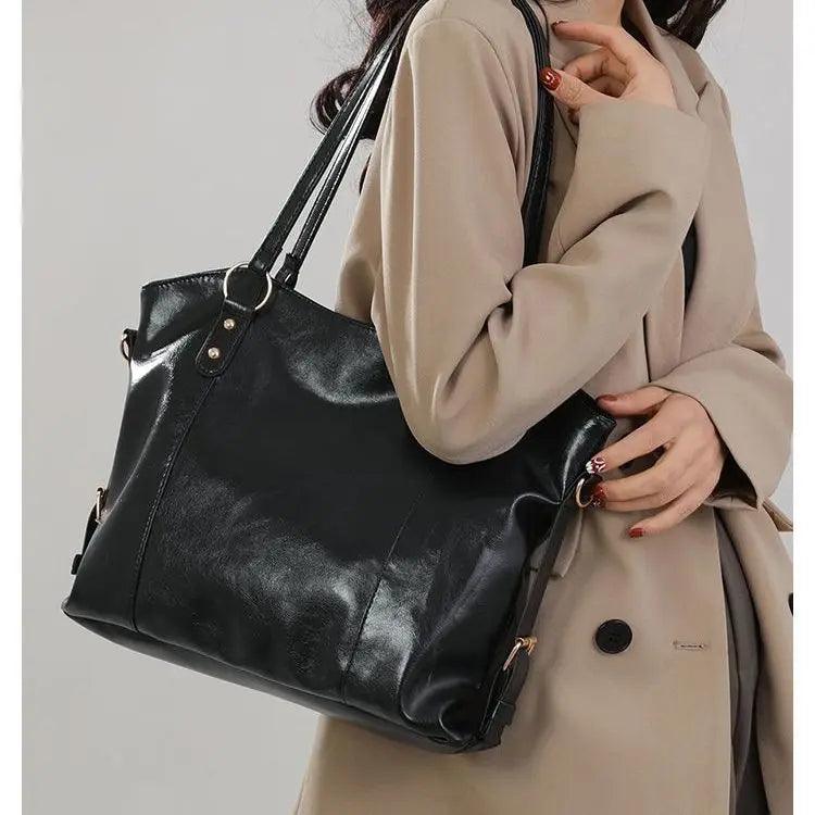 BORSA IN PELLE - DIN