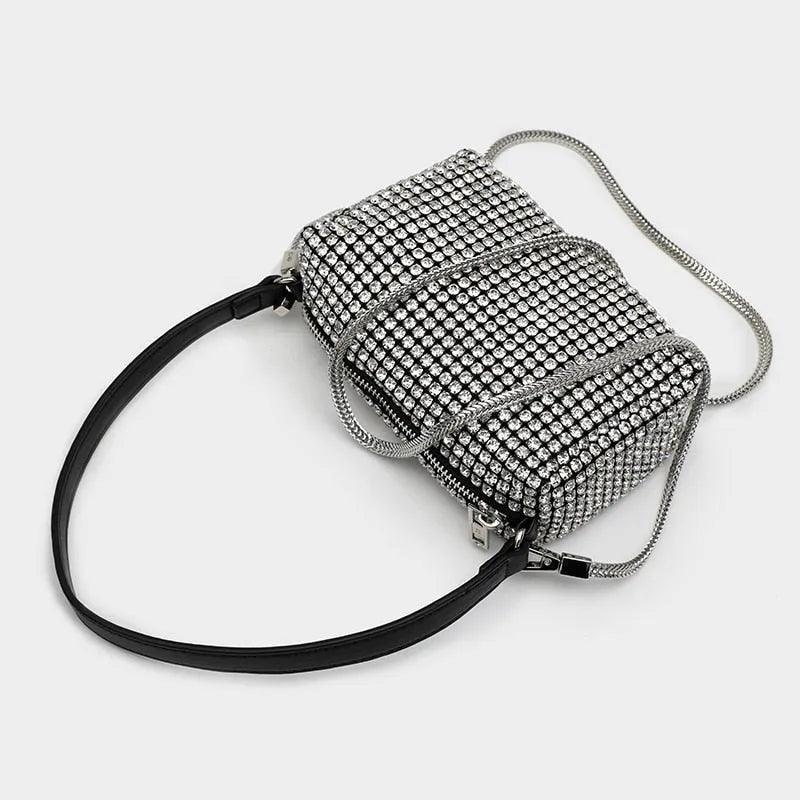 BORSA COMPATTA CON BORCHIE - LUXURY