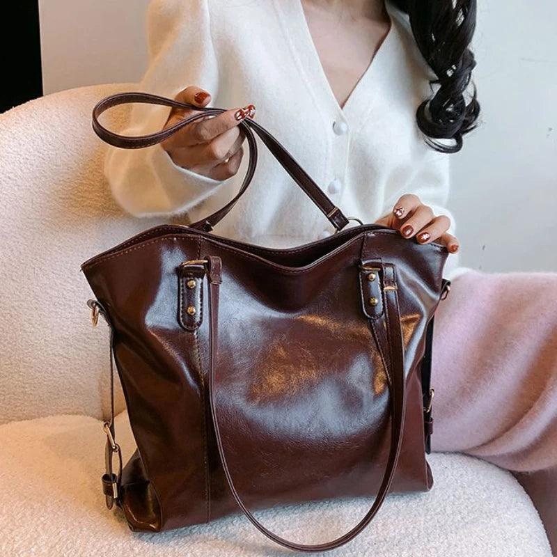 BORSA IN PELLE - DIN