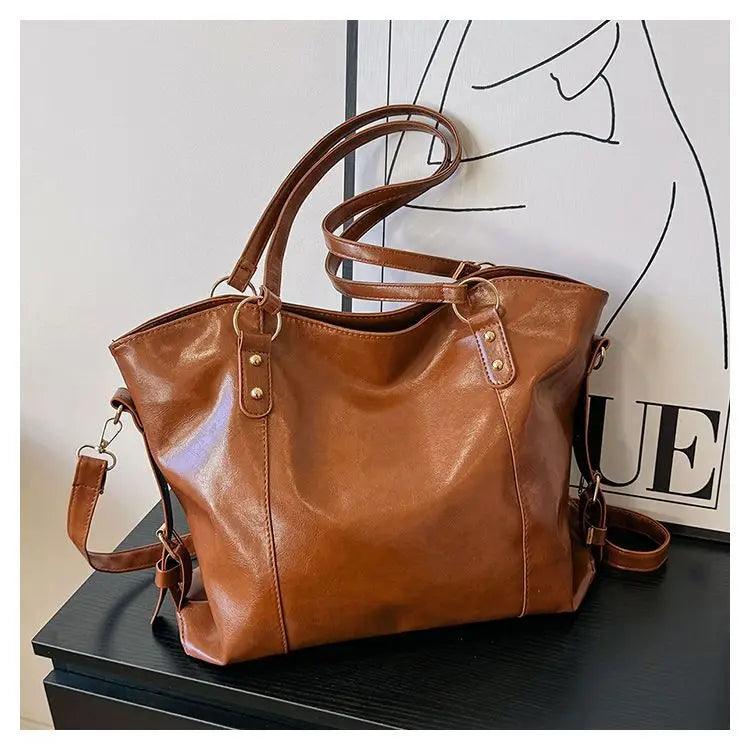 BORSA IN PELLE - DIN