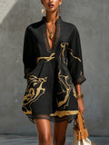 Ébène | V-Neck Mini Dress, Black and Gold Print