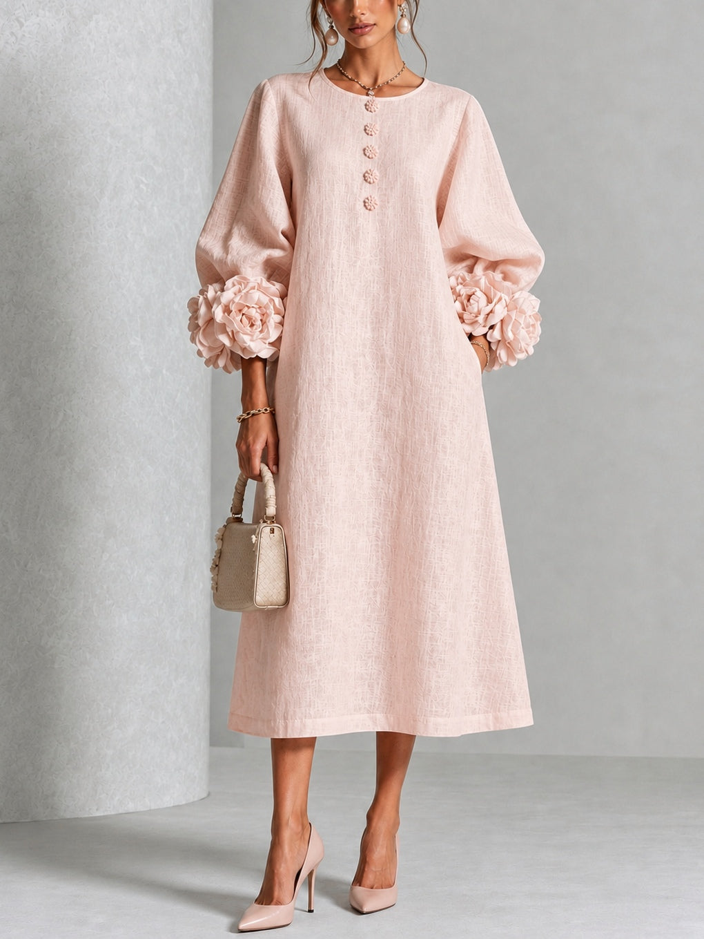 Vestido midi floral rosa con botones y mangas extravagantes