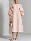 Vestido midi floral rosa con botones y mangas extravagantes