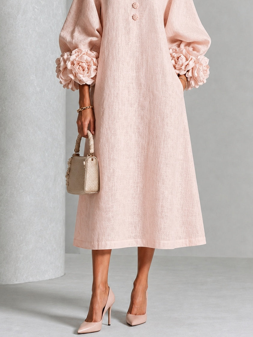 Vestido midi floral rosa con botones y mangas extravagantes