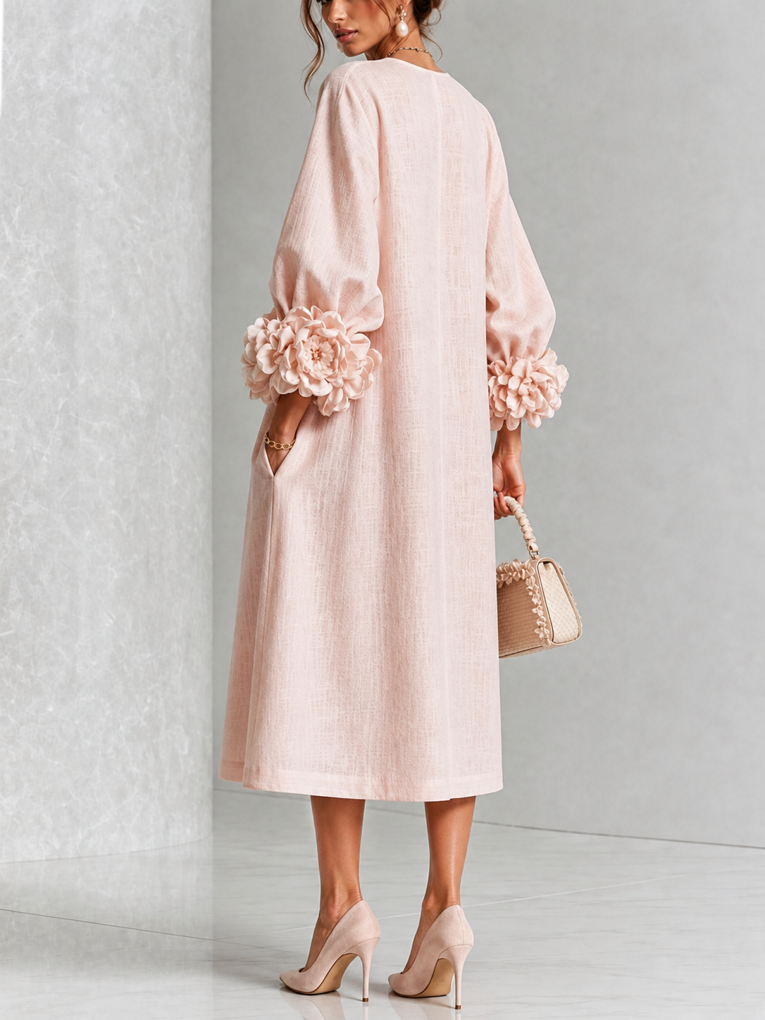 Vestido midi floral rosa con botones y mangas extravagantes