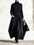 Odette | Vestido maxi negro oversize con cuello alto