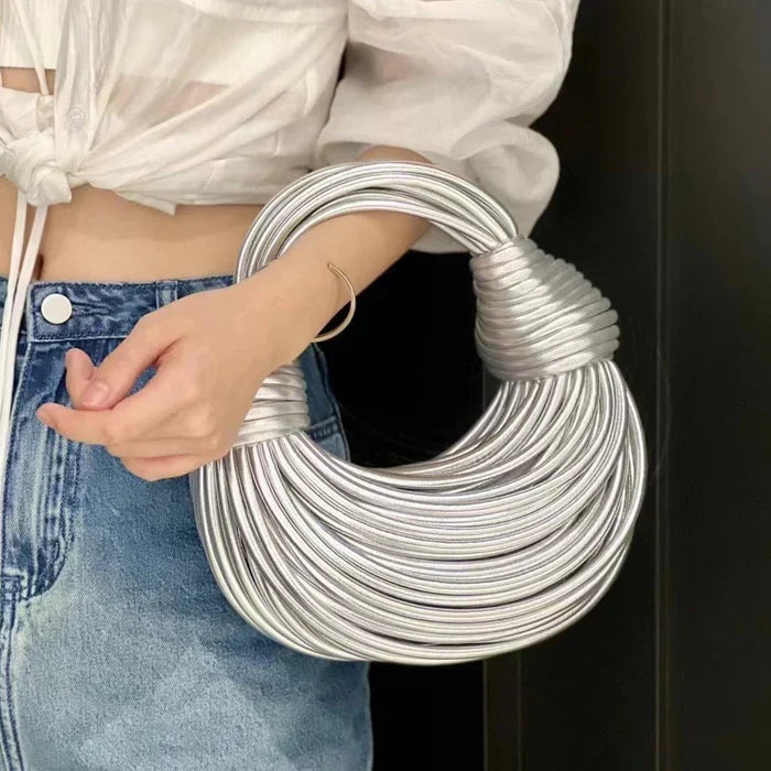 SCULPTURAL DESIGN RIGID BAG