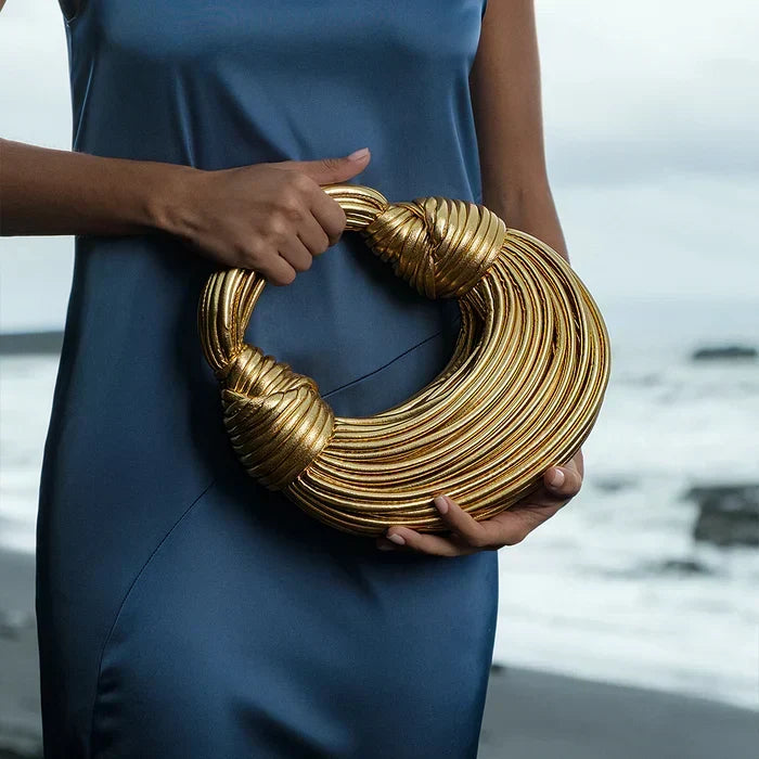 SCULPTURAL DESIGN RIGID BAG